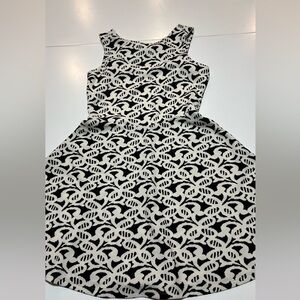 Charming Charlie black and white butterfly high neck dress with bow on back